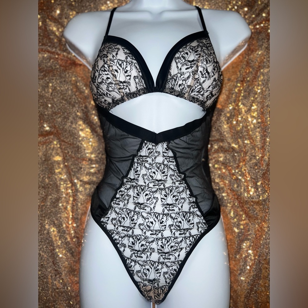 Tiger 🐅 Victoria’s Secret Teddie size(M) black silk w/ embroidered 🐯 pattern.